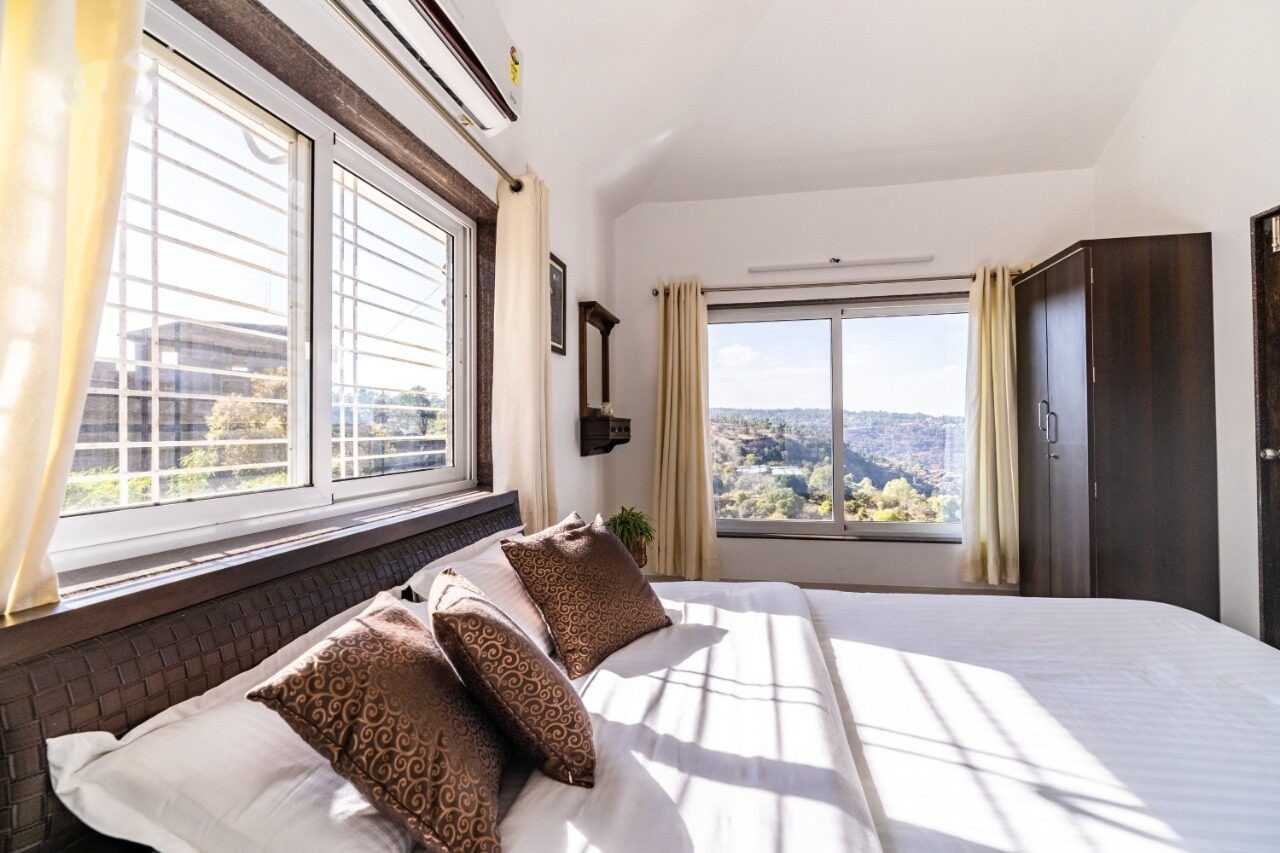 Bedroom with valley view window